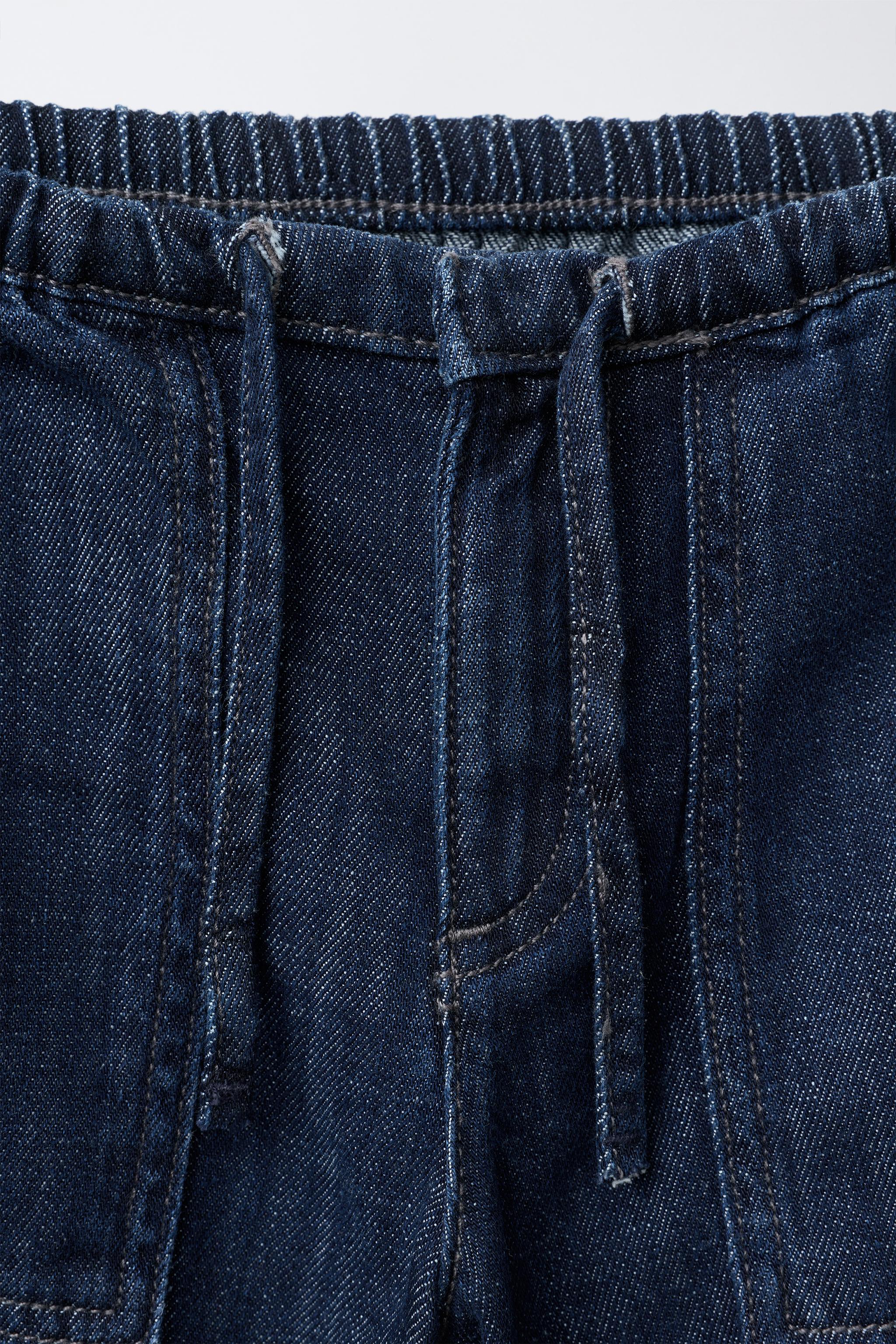 FLOWY WIDE-LEG JEANS